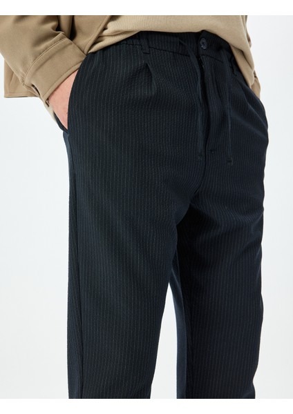 Yeni Sezon Katlamalı Paça Viskon Karışımlı Düğmeli Beli Bağcıklı Slim Fit Yazlık Pantolon