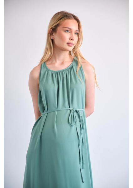 Hamile Beli Bağcıklı Sıfır Kol Midi Boy Saten Elbise Yeşil