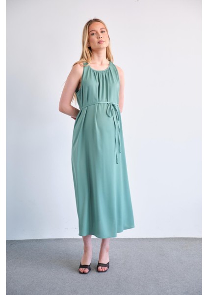 Hamile Beli Bağcıklı Sıfır Kol Midi Boy Saten Elbise Yeşil fırsatları