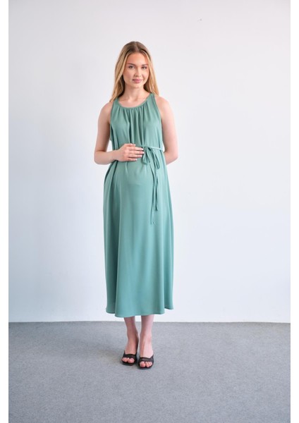 Hamile Beli Bağcıklı Sıfır Kol Midi Boy Saten Elbise Yeşil indirimleri