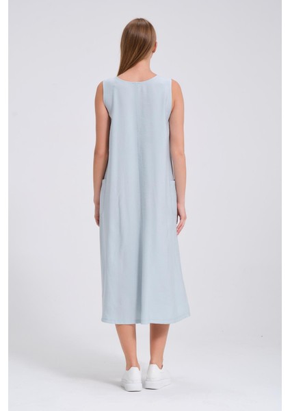 Hamile Sıfır Kol Önden Düğmeli Yandan Cepli Midi Boy Elbise Mintyeşili indirimleri