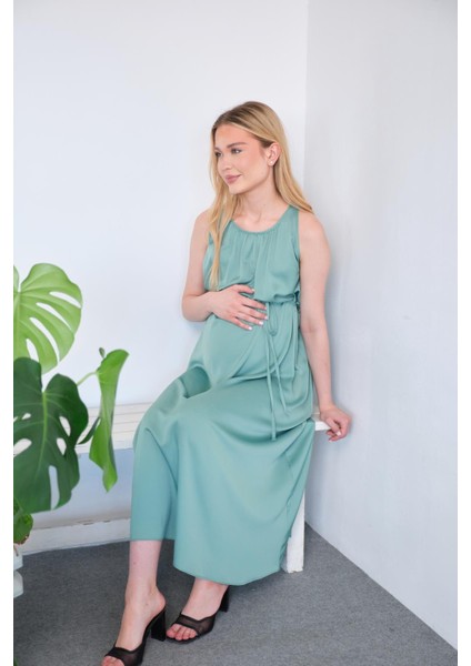 Hamile Beli Bağcıklı Sıfır Kol Midi Boy Saten Elbise Yeşil fiyatları