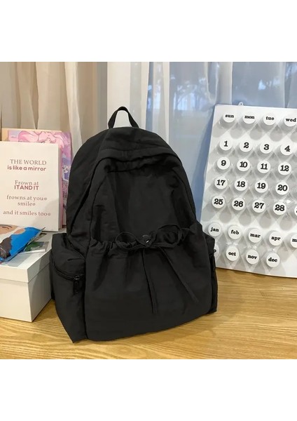Yeni Öğrenci Sırt Çantası Kadınlar Japon Tarzı Hafif ve Şık Sırt Çantası Düz ​​renk Basit Yay Sıradan Seyahat Sırt Çantası Renk: Siyah (Yurt Dışından)