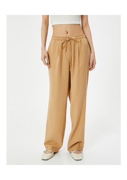 Bol Paça Pantolon Viskoz Kumaş Beli Bağlamalı Cepli modelleri