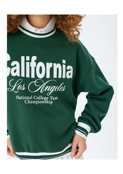 Bisiklet Yaka Kolej Baskılı Biyeli Oversize Sweatshirt indirimleri