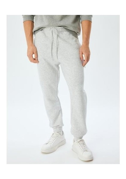 Eşofman Altı Beli Bağcıklı Fermuarlı Cep Detaylı Şardonlu Pamuk Karışımlı modelleri