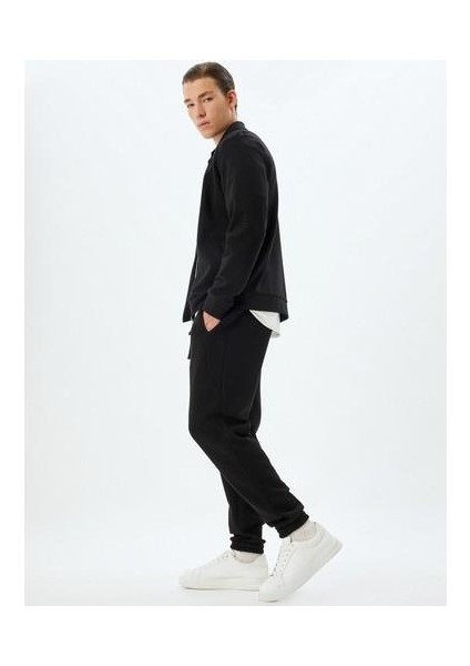 Eşofman Altı Beli Bağcıklı Dikiş Detaylı Cepli Pamuk Karışımlı Lastikli Paça Şardonlu fiyatları