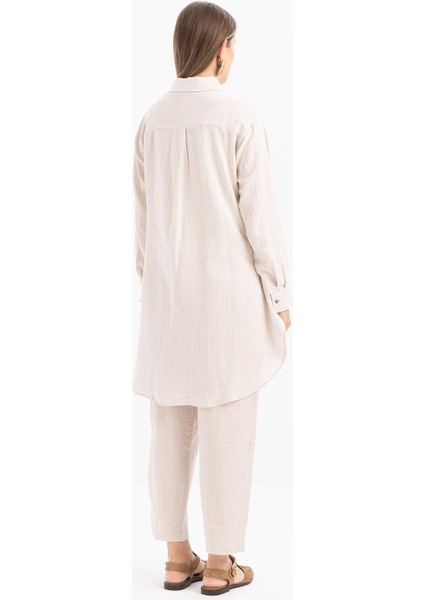 Taş-Arkası Uzun Patlı Gömlek fırsatları