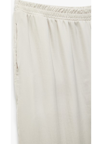 Oversize Cep Detaylı Beli Lastikli Pantolon modelleri