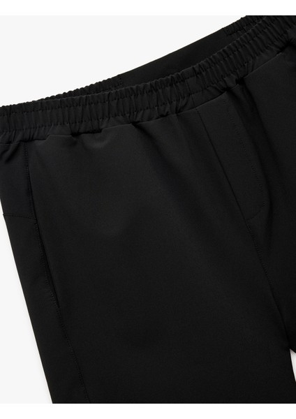Fermuarlı Cep Detaylı Beli Lastikli Oversize Paraşüt Kumaş Spor Şort