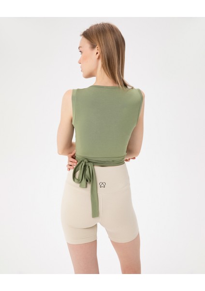 Kadın Açık Yeşil Kolsuz Anvelop Wrap Bluz - EcoVero™ Viskoz, Belden Bağlamalı, V Yaka, Çift Kat Ön Panel, Çok Yönlü Crop fiyatları