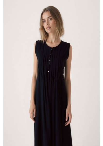 Önü Düğmeli Krinkıl Kumaş Sıfır Kol Elbise fırsatları