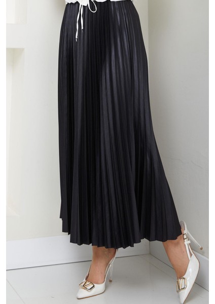 Beli Lastikli Deri Görünümlü Sık Piliseli Etek Siyah HM2655 modelleri