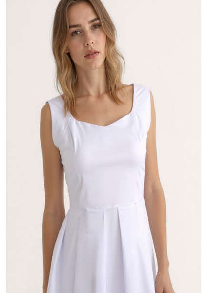 Kalp Yaka Sıfır Kol Pileli Elbise modelleri