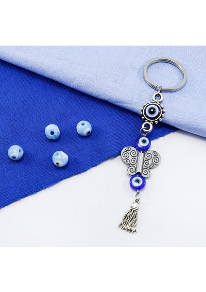 Çerçeveli Nazar Püsküllü Kelebek Anahtarlık, Hediyelik Nazar Boncuklu Çanta Süsü fiyatları