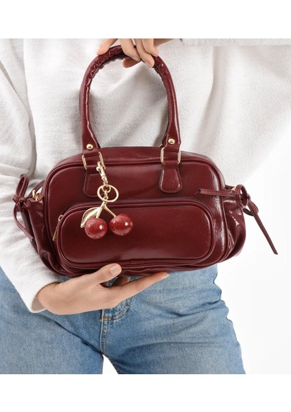 Casandra Model Bordo Kadın El ve Omuz Çantası (Charm Dahil Değildir) Hediye Paketi Şeklinde Gönderilir fiyatları