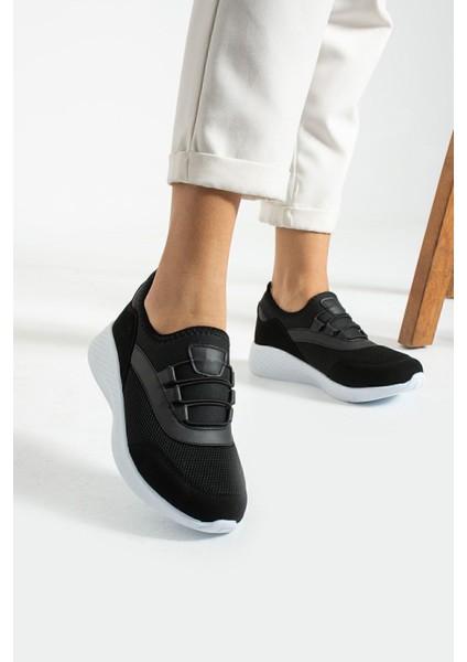 Siyah Beyaz Anatomik Esnek Taban Slip-on Spor Ayakkabı Günlük Sneaker fiyatları