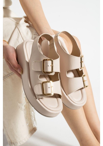 Bej Kalın Taban Lastik Detaylı Çift Toka Sargılı Sandalet indirimleri