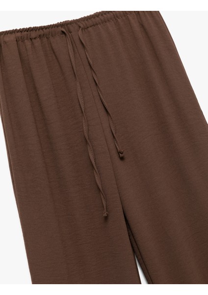 Aerobin Kumaş Geniş Paça Beli Bağcıklı Pantolon modelleri