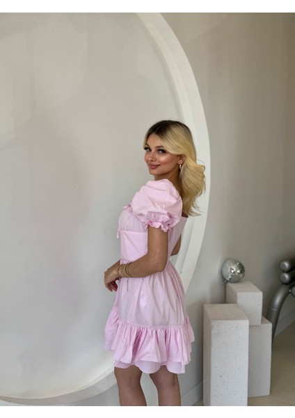 Pembe Kabarık Kol ve Düğme Detaylı Elbise indirimleri