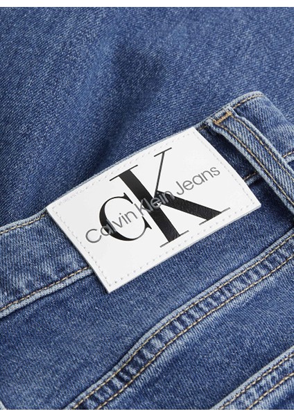 Tapered Fit Koyu Mavi Kadın Düz Denim Pantolon Mom Jean modelleri