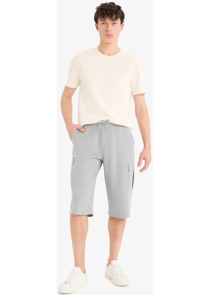 Yeni Sezon Slim Fit Dar Kesim Kargo Cepli Basic Düz Kapri Şort fiyatları