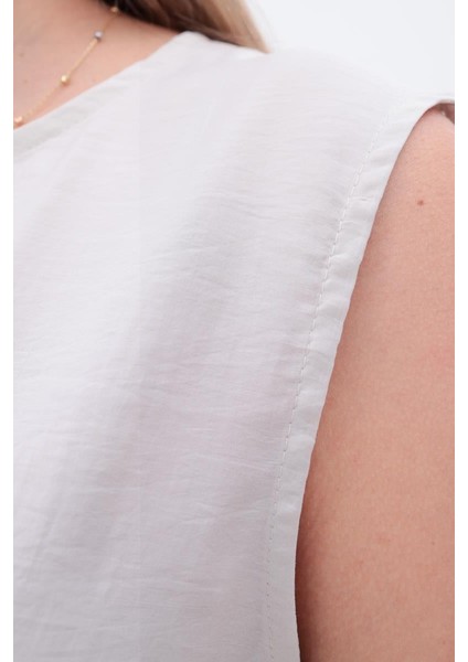 Taş-Basıc Sıfır Kol Içlik Tunik indirimleri