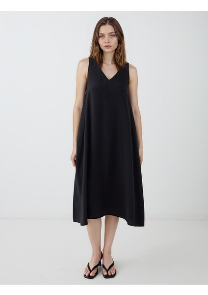 Siyah V Yaka Bol Kesim Dokuma Elbise