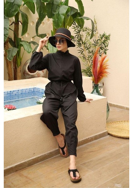 Paçası Pileli Tasarım Tesettür Paraşüt Kumaş Tulum Mayo fiyatları