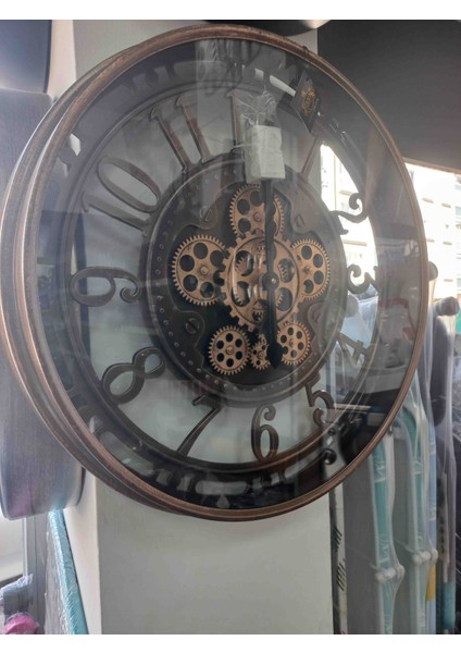 Megline GÖNÜL4397 Duvarsaati 60CMDuvarsaati çarkli metal cerçeve pilli