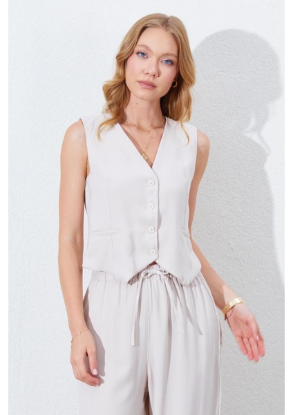 Kadın Açık Bej Fleto Cepli Arkası Gipeli Yelek fiyatları