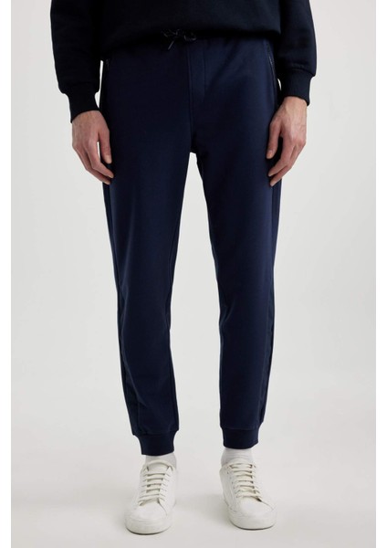 Eşofman Altı Slim Fit Dar Kesim Basic Düz Beli Bağcıklı Esnek Paça Fermuar Cepli A6499AX24SP