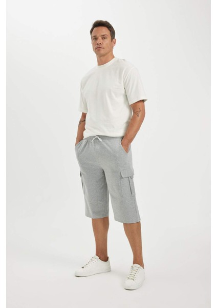 Slim Fit Dar Kesim Kargo Cepli Basic Düz Kapri Şort T4693AZ24SM fırsatları