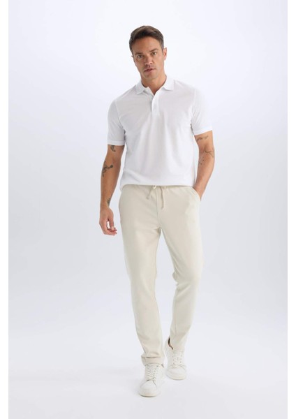 %100 Pamuk Regular Fit Polo Yaka Kısa Kollu Basic Düz Pike Kumaş Tişört C1293AX25SP modelleri