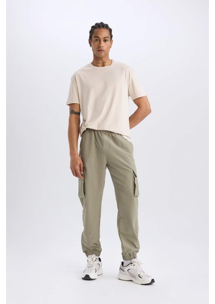 DeFactoFit Sporcu Jogger Eşofman Altı Slim Fit Dar Kesim Dokuma Kargo Cepli Standart Paça D3884AX24WN