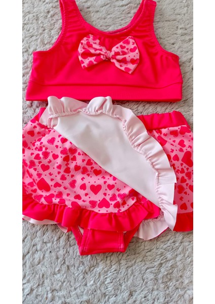 Kalpli Etekli Fiyonk Detaylı Kız Çocuk Bikini Takımı fiyatları