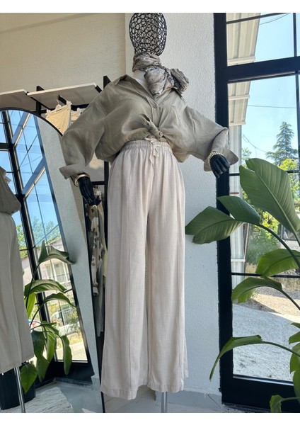 Ikol Kot Tensel Bol Paça Pantolon Bej fiyatları