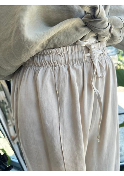 Ikol Kot Tensel Bol Paça Pantolon Bej modelleri