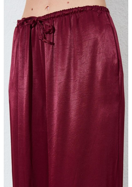 Kadın Bordo Beli Ince Lastik Detaylı Saten Pantolon indirimleri