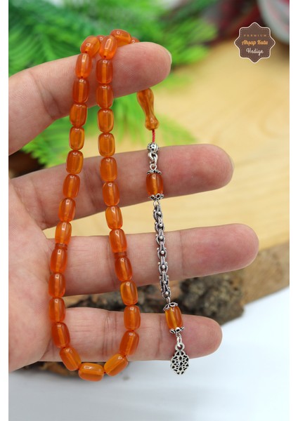 Turuncu Kapsül Kesim Gümüş Ivme Püsküllü Ateş Kehribar Tesbih 201024373 fırsatları