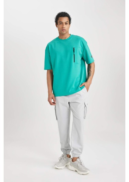 Fit Sporcu Jogger Eşofman Altı Standart Fit Kargo Cepli Dokuma Beli Paçası Lastikli C0043AX24SP