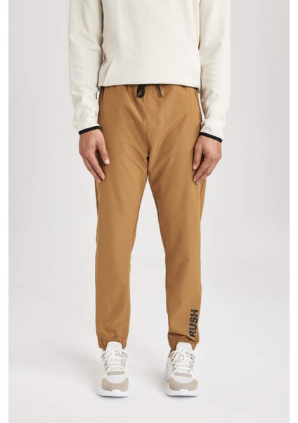 Fit Dokuma Esnek Multifonksiyonel Sporcu Jogger Eşofman Altı Slim Fit Dar Kesim Çift Cepli C1212AX24AU