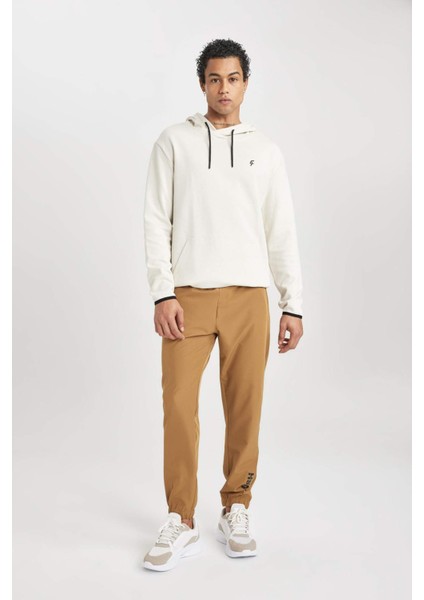 Fit Dokuma Esnek Multifonksiyonel Sporcu Jogger Eşofman Altı Slim Fit Dar Kesim Çift Cepli C1212AX24AU fiyatları