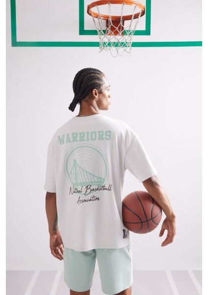 Defactofit Nba Golden State Warriors Oversize Geniş Kalıp Bisiklet Yaka Sırt Baskılı Kısa Kollu TIŞÖRT D8611AX25SP