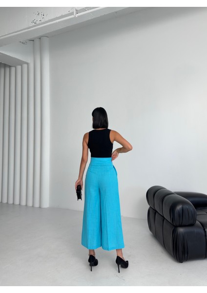 Kadın Keten Toka Detaylı Bilek Boy Wide Leg Pantolon fiyatları