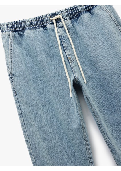 Pamuklu Cep Detaylı Beli Bağcıklı Jean Pantolon modelleri