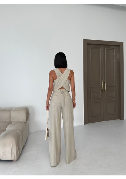 Kadın Keten Toka Detaylı Bilek Boy Wide Leg Pantolon fiyatları