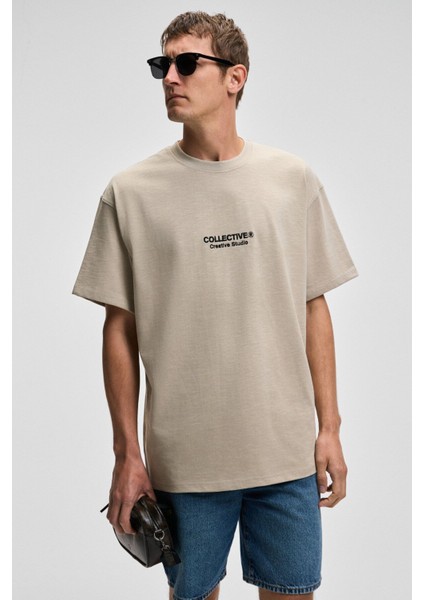 COLLECTIVE Erkek Ön Nakış Arka Baskı Detaylı %100 Organik Pamuk Oversize Kısa Kol Taş Rengi T-Shirt indirimleri