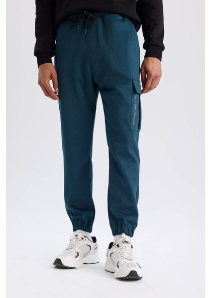 DeFactoFit Sporcu Jogger Eşofman Altı Standart Fit Üç Cepli Beli Bağcıklı Lastikli Paça D3741AX24WN