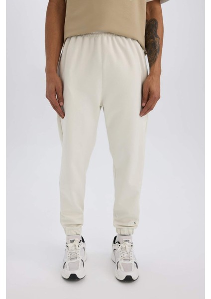 Fit Sporcu Jogger Eşofman Altı Standart Fit Basic Düz Cepli Beli Paçası Lastikli D3742AX24WN